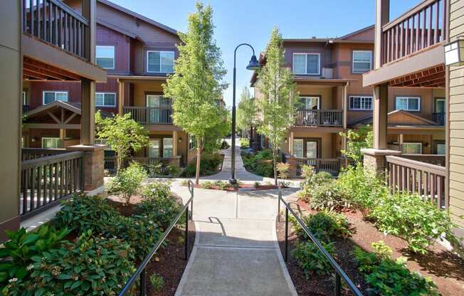 Sunset Crossing Apartments exterior with walkway