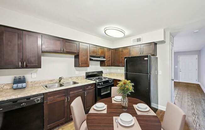 Kitchen with black appliances in affordable two bedroom apartment in Marietta Georgia