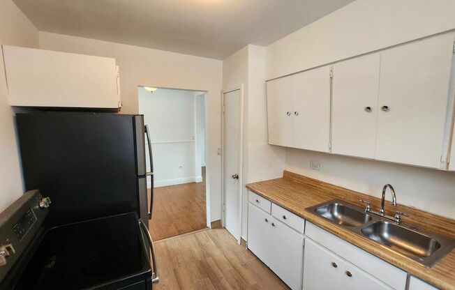 Charming 2-Bed Single-Family Home featuring Hardwood Floors & Huge Yard