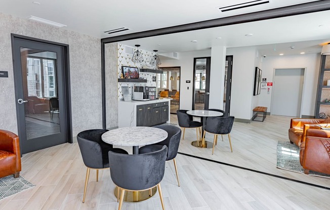 resident lounge with casual seating and drink station at Bayswater Apartments, Burlingame, CA