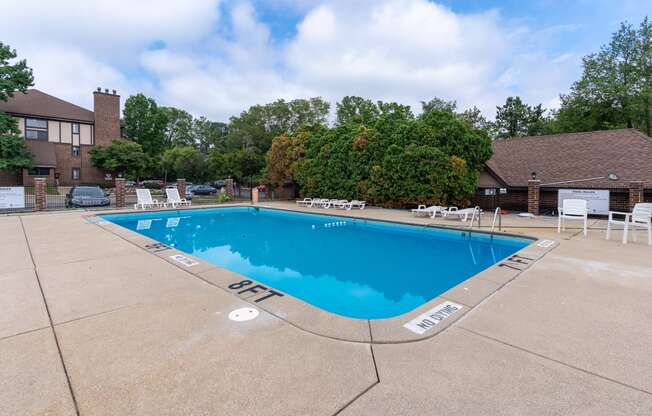 the preserve at ballantyne commons resort style swimming pool with chairs and a house