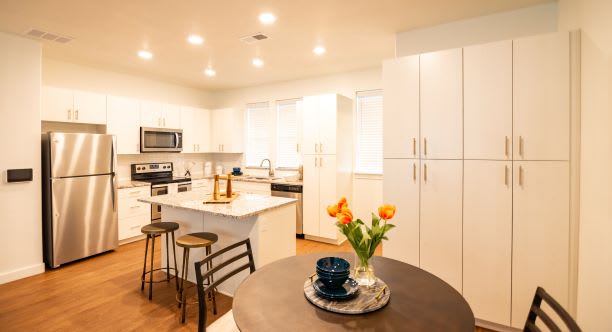 Open Kitchen With Island Dining at Parc View Apartments & Townhomes, Midvale, UT