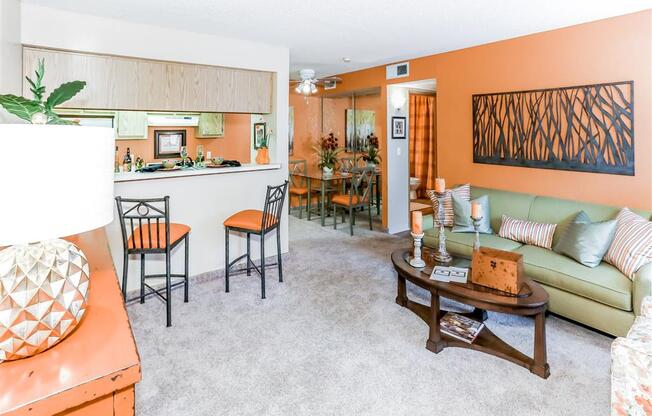 Pass through kitchen to living room of Country Club at Valley View Senior Apartments in Las Vegas, NV, For Rent. Now leasing 1 and 2 bedroom apartments.