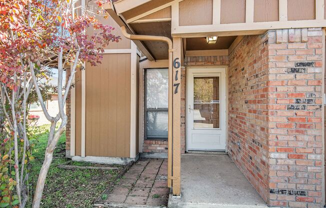 Modern duplex featuring three bedrooms and two bathrooms with an attached garage.