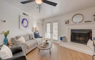 Brentwood Oaks Apartments in Nashville Tennessee photo of a living room with a couch and a fireplace