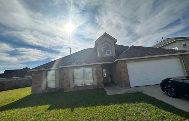 Beautiful Brick 4 Bedroom/2 Bath home in Ascension Trace Subdivision Available NOW!