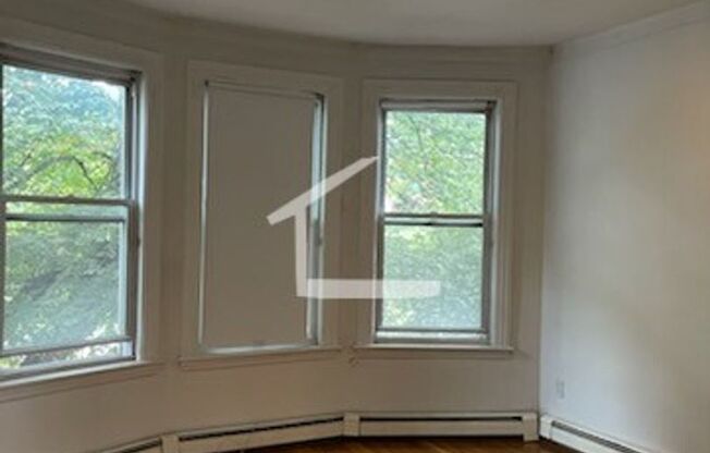 Parking Included, In Unit Washer and Dryer, Steps from the T Stop, two Full Bathrooms