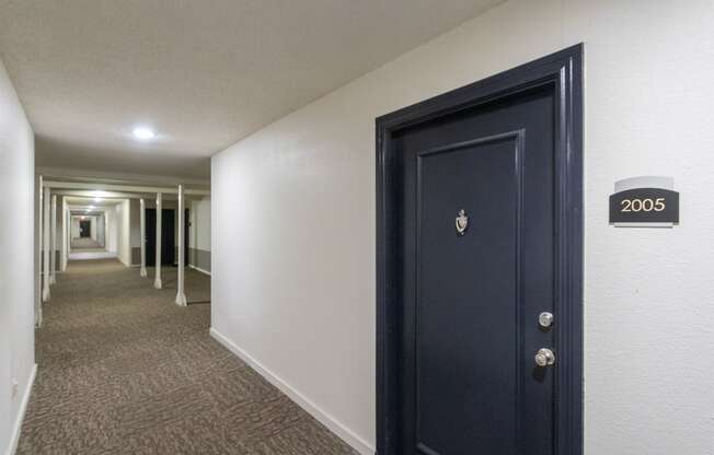 This is a photo of the hallway at Cambridge Court Apartments in Dallas, TX.