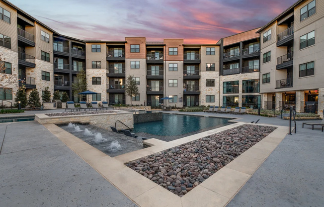 take a dip in the resort style pool at the bradley braddock road station apartments  at Aurora Watson Branch, Mansfield, Texas