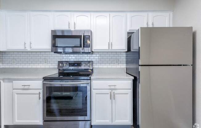 Renovated kitchen with stainless steel appliances