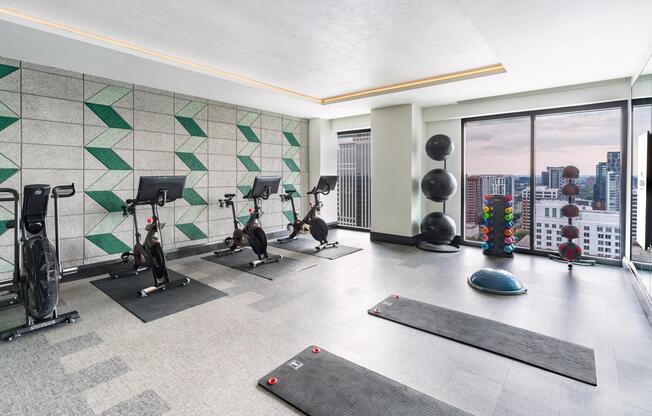 Our light-filled fitness studio at Modera Parkside in Atlanta pairs skyline views with space to train, stretch, and recharge just moments from Midtown.