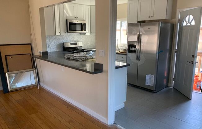Epic REA-Great 1 BR/1 BA Unit in a S/S Duplex