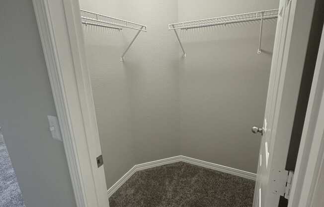 a small room with a carpeted floor