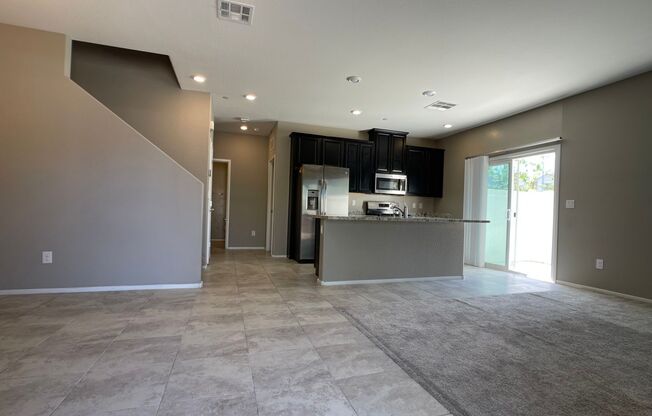 GATED 3 BED 2.5 BATH 2 CAR GARAGE TOWNHOME W/ LOFT + BED & SHOWER DOWNSTAIRS IN NLV