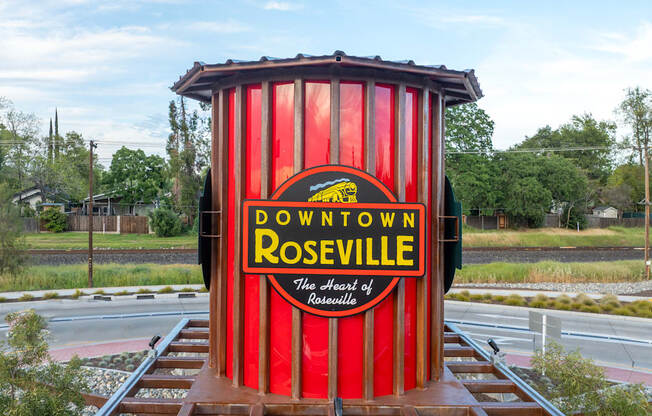 A red and white sign that says Downtown Roseville.