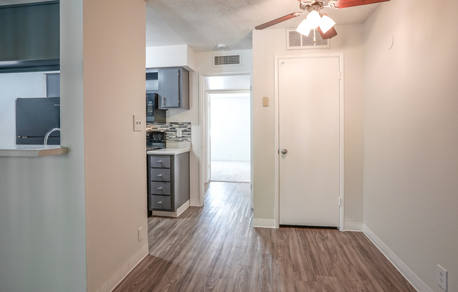 Dining area with ceiling fan at Treehouse Apartments in Albuquerque, New Mexico