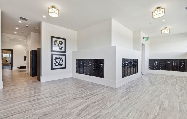 a large room with white walls and a large wall calendar on the wall and a at LynnCora, Grand Prairie