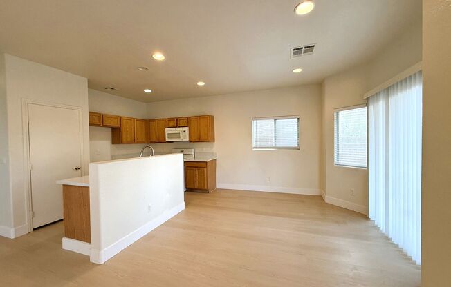 Open floor plan home with brand new vinyl plank flooring throughout! Bedroom & Bathroom downstairs!
