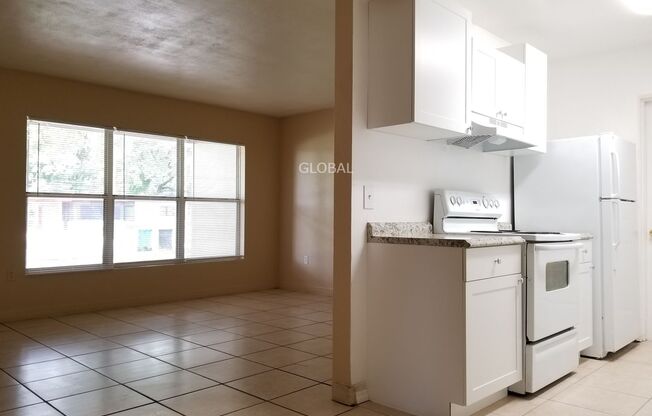 Charming 3-Bedroom Home with Spacious Backyard and One-Car Garage.