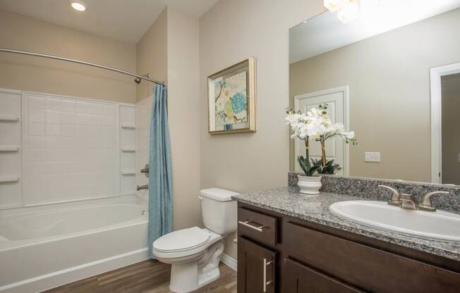 Renovated Bathrooms With Quartz Counters at The Passage Apartments by Picerne, Henderson