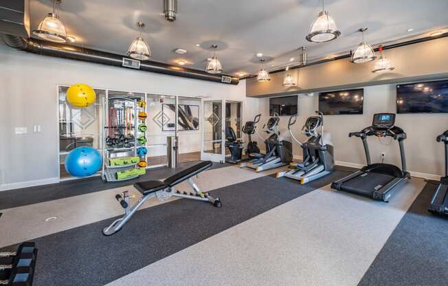 Fully Equipped Fitness Center at Abberly CenterPointe Apartment Homes by HHHunt, Midlothian, VA