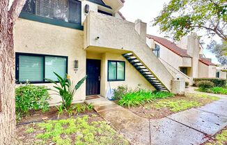 Charming Entry Level Condo Unit with Reserved Parking Space, Private Garage, & Community Pools & Tennis Courts!