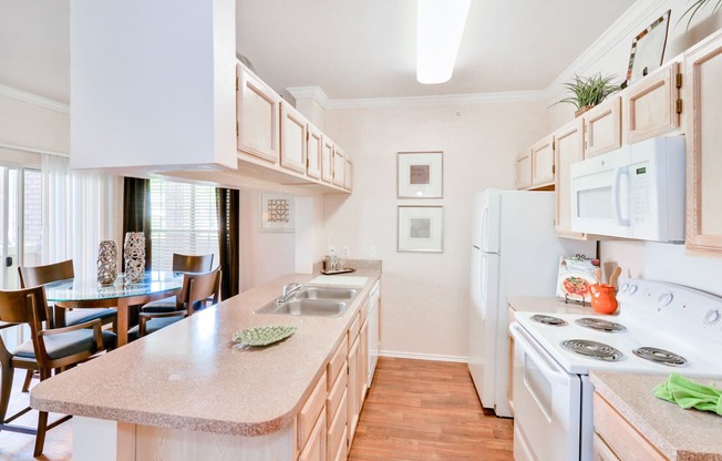 Dishwasher at Turnberry Isle Apartments in Far North Dallas, TX, For Rent. Now leasing 1, 2 and 3 bedroom apartments.