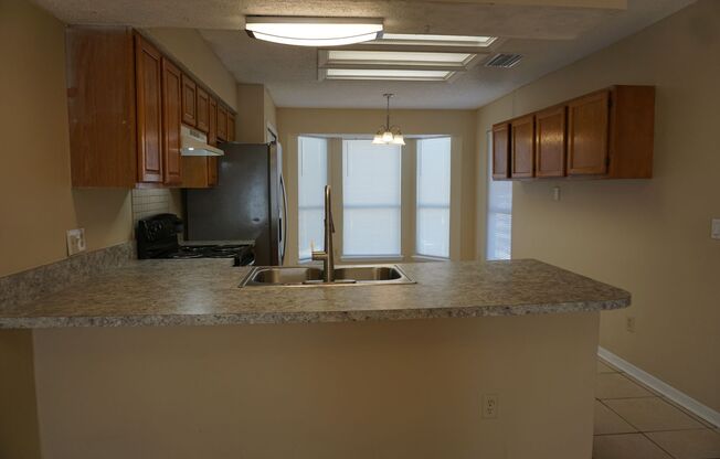 3 bedroom 2.5 Bathroom townhome with fenced back yard