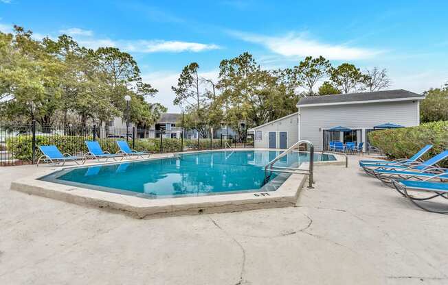 our resort style swimming pool is next to our clubhouse and has lounge chairs around it