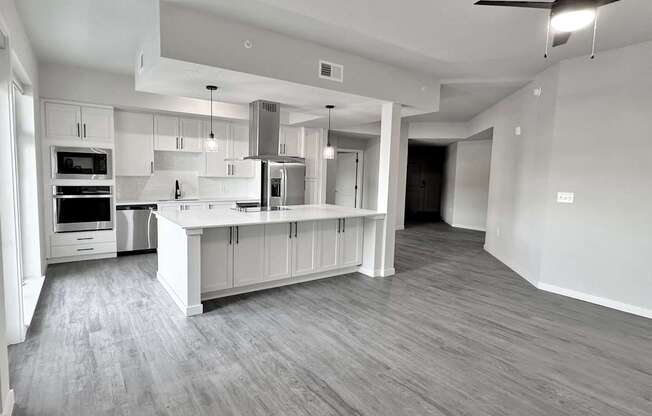 Wine coolers, large undermount kitchen sink and trendy tile backsplashes