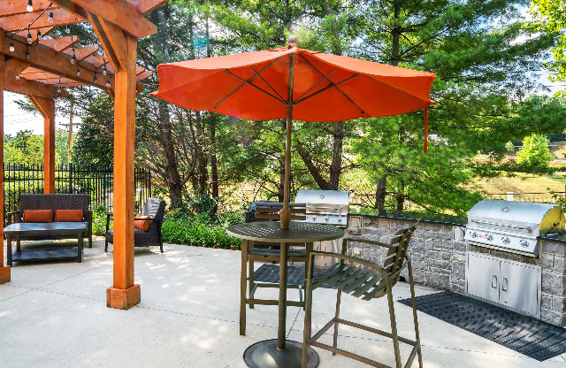 Outdoor kitchen and grilling stations