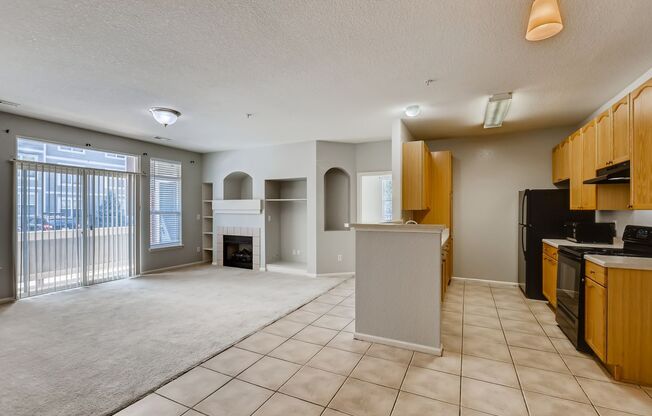 Bright 2-Bedroom Aurora Condo | Fireplace, Balcony + Community Pool