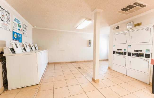 a laundry room with a washer and dryer