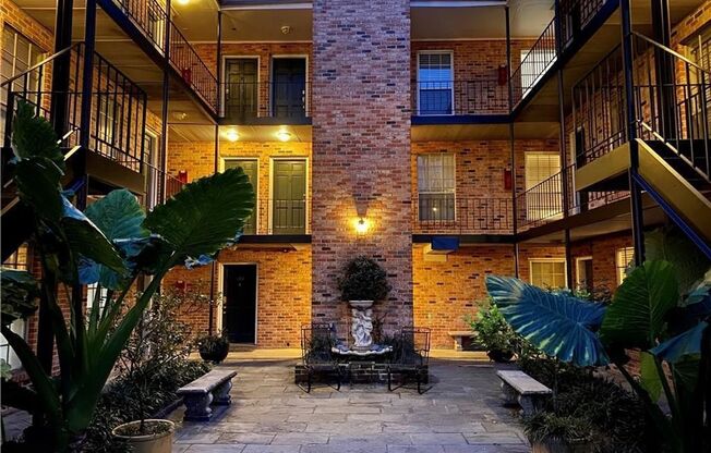 Gated Condo steps from Maple Street & St Charles!
