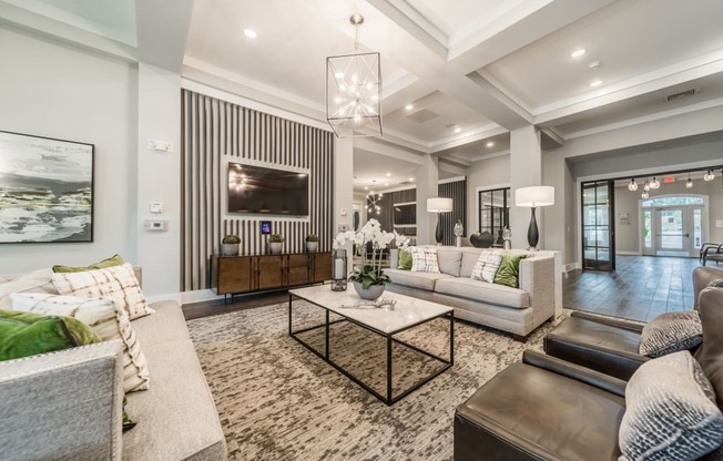 a living room with couches and a coffee table