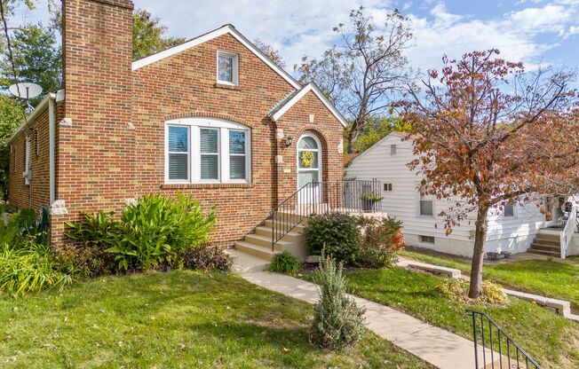 Brentwood Single Family Home w/ Finished Basement, Sunroom, Fenced Yard, and a 1 Car Garage