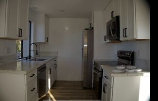 2 Bedrooms 2 full baths corner condo in National City.