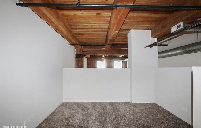 Unique bedroom space with genuine wood ceilingsat Carriage House Lofts, Chicago