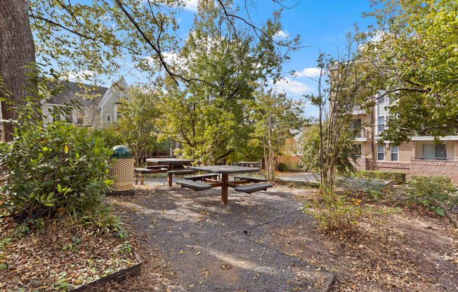 A picnic table at Ten05 West Trade Apartments.