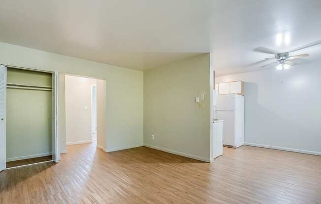 a living space with hardwood flooring