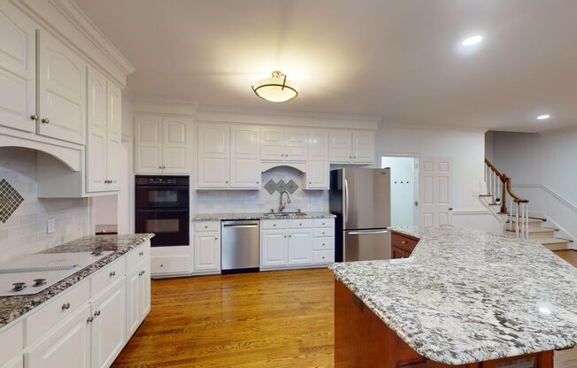 Exquisite full brick, beautifully maintained home in Providence Country Club