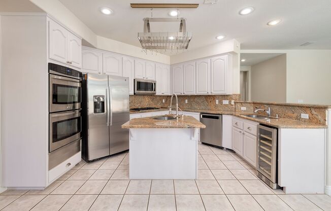 2 Story Summerlin Home with Refreshing Pool & Lush Landscaping