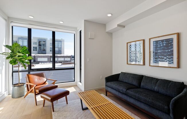 Rare condo available in boutique condo building w/roof deck, elevator, bike parking and storage!