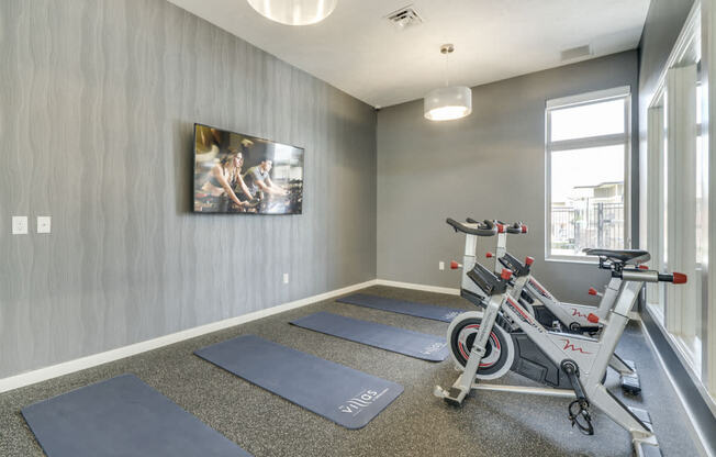 Yoga/spin studio at The Villas at Falling Waters luxury townhomes for rent in west Omaha NE