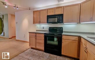 Stunning Downtown Condo with River Views, Included Amenities and a Pool !