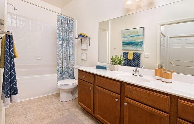 a bathroom with a toilet sink and bathtub