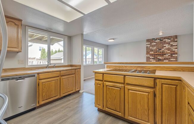Spacious 5-Bedroom Home with Beautiful Backyard Retreat