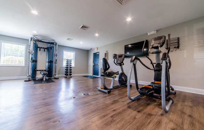 Fitness center at Ashton Brook Apartments features cardio and weight training equipment