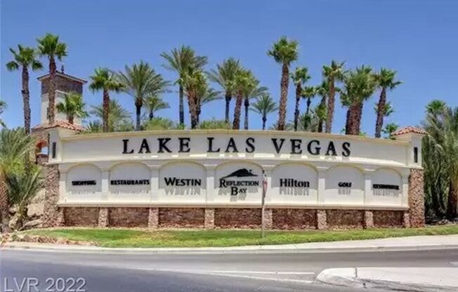 Exquisite fully furnished 2 Bed/2 Bath, Den/Office Single Story home in prestigious Lake Las Vegas. Strip and Golf Course Views