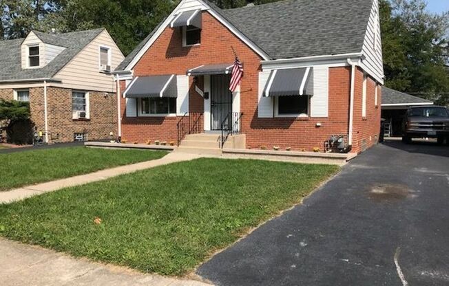 FREE APPLICATION!! Beautiful 4 bedroom house in great Dolton neighborhood w/ Huge Back Yard!